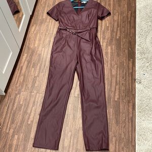 Burgundy faux leather jumpsuit .SZ L
